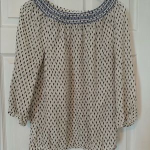 embroidered detail around neck line